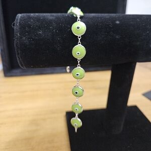 76. 925 Sterling Silver Lime Green Evil Eye Bracelet